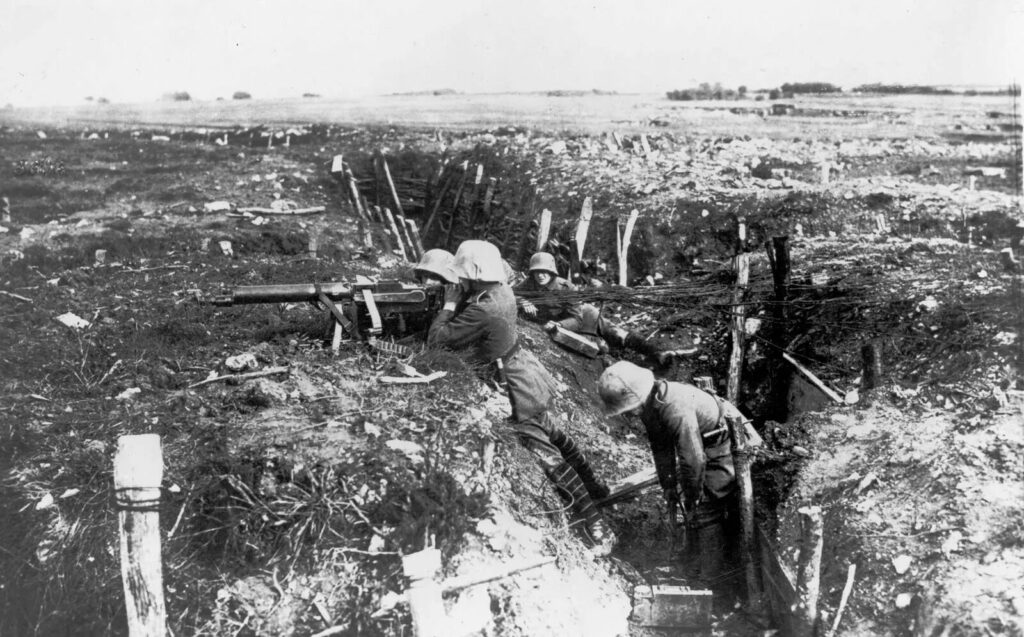A World War One trench, surrounded by a decimated landscape.